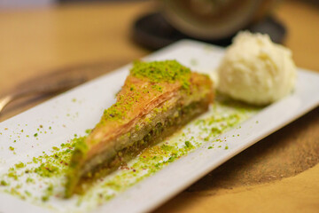 Traditional delicious Turkish baklava with ice cream