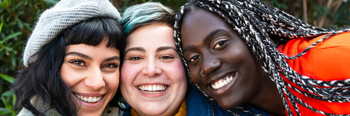 Diverse young people having fun in outside – multi ethnic group happy friend at park – portrait...