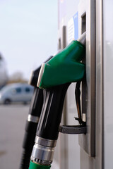 Petrol pump filling nozzles - Gas station - Energy Crisis concept