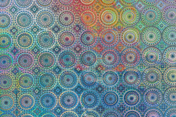 bright led light on interesting flower grid rainbow holo foil material, glitter pattern. poster background. 