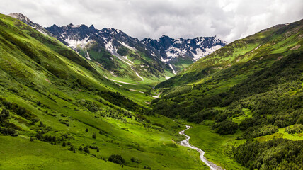 Fototapeta na wymiar Stunning Mountains of High Caucasus in Georgia in Svaneti Region. Travelling and hiking the Sagari-Pass. Beautiful landscape.