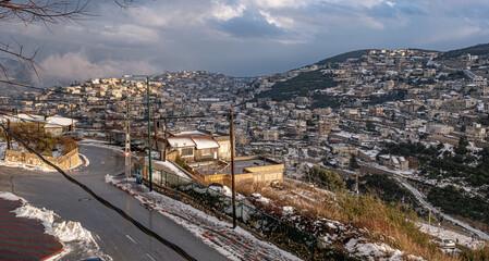 Winter view of the Druze village of Beit-Jann in snow, Mount Meron, Upper Galilee, Northern Israel,...