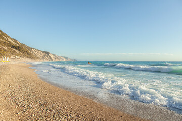 Seashore, blue sea water and wild sandy beach landscape at the morning