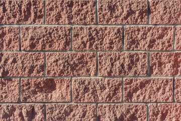 Brick wall background outside of the building.