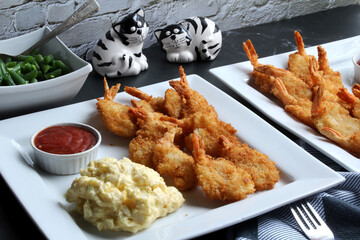 Breaded Shrimp, potato salad and green beans.