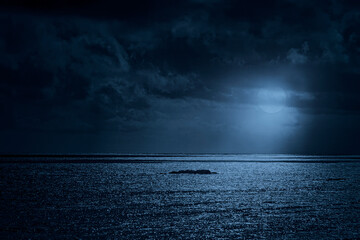 Glistening sea in a full moon night