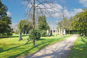 Düsseldorf (Golzheimer Friedhof), Germany - March 21. 2022: View on old cemetery with ancient...