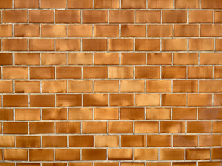 An orange brick textured wall