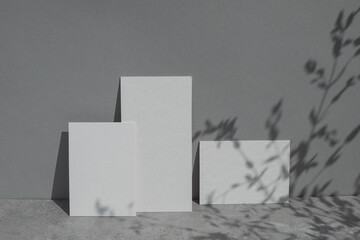 Brand identity mockup design. Composition of blank paper cards mock ups on grey background.