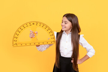 happy child in school uniform hold mathematics protractor for measuring, logic