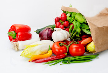 fresh vegetables in a paper bag