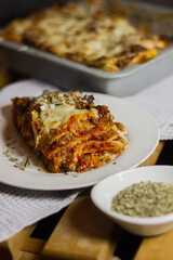 Delicious meat lasagne with bolognese sauce and bechamel. Italian traditional cuisine. Home cooking. High quality photo