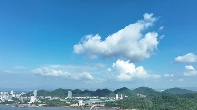 suburb city and blue sky fluffy clouds surround by mountain or hill beautiful area concept Nature and City town patronize together, Clean Air at subure town
