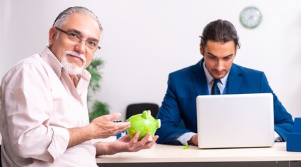 Financial advisor giving retirement advice to old man