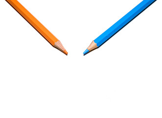 Two colored pencils (Orange and Blue) on a white background. copy-space