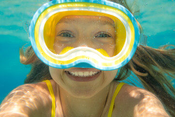 Underwater portrait of child in the sea