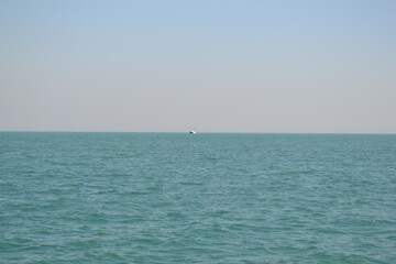 Obraz premium We are located in Cesenatico, an Italian town in Romagna, on the coast of the Adriatic Sea. View of the port, beach, sea.