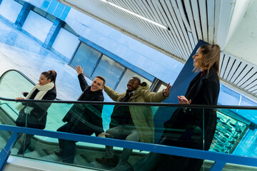 Going down the escalator while acting crazy and having a great time together