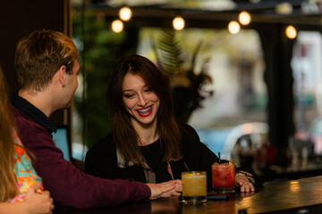 Making her laugh on the bar