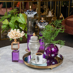 luxury decorative home accessories on tea table with flowers