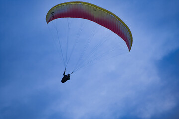 Shot of someone flying with parachute