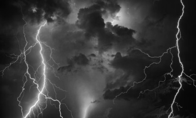 Fork lightning striking down during summer storm