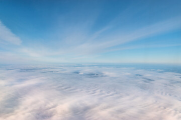 Fototapeta na wymiar Blue sky above the clouds.