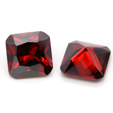 Closeup of red ruby gemstones isolated on a white background