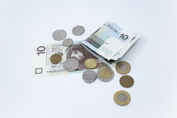 Fototapeta premium Zloty - Polish banknote. Polish currency on a white background arranged in a pattern. Illustrates cash flow and business