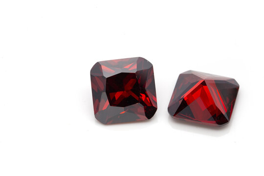 Closeup Of Red Ruby Gemstones Isolated On A White Background