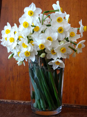 Daffodils on a glass vase. 