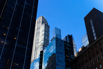 Newly built ultra luxury high-rise residential buildings stand among Midtown Manhattan skyscraper...