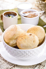 Brazilian cheese bread, in white bowl. Bread made with cheese and served hot, typical of the state of Minas Gerais