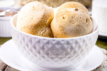 Brazilian cheese bread, in white bowl. Bread made with cheese and served hot, typical of the state of Minas Gerais