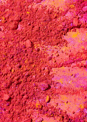 Crushed eye shadow palette close up texture background