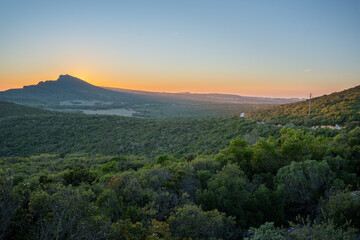 Beautiful view of a wooded valley with the last rays of sunset