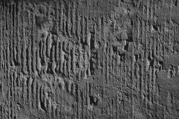 gray background, in the photo, gray concrete wall close-up.