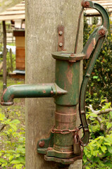 antique iron water pump