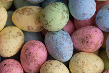 closeup of colorful small eggs background.
