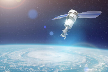 Obraz na płótnie Canvas Research, probing, monitoring of tracking in a cyclonic vortex, a hurricane. Satellite above the Earth makes measurements of the weather parameters. Elements of this image furnished by NASA.