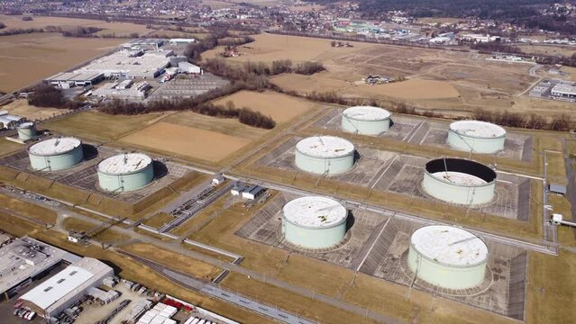 Aerial view of huge fossil oil storage reservoir tanks and facility
