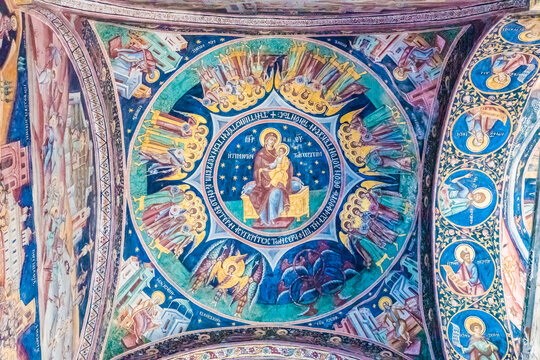 HOREZU, ROMANIA - AUGUST 15, 2016: Ceiling fresco paintings of Horezu Monastery in Romania. The Horezu Monastery is a UNESCO World Heritage Site.