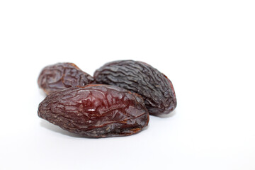 Fresh dates isolated on white background. Dried medjool. Ramadan concept