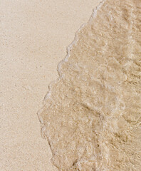 Transparent sea water on sea sand, natural backgrounds.