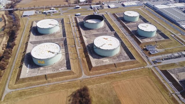 Aerial view of huge fossil oil storage reservoir tanks and facility