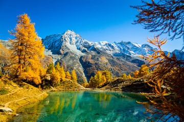 Fototapeta Blue lake - Lac Bleu - and amazing mountains near Arolla in Valais Canton, Switzerland obraz