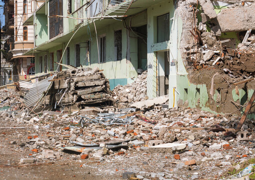 Apartment building destroyed in the city center. 