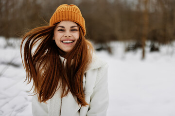 portrait of a woman red hair walk in the fresh winter air fresh air