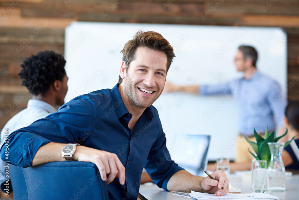 Poster making my creativity work for me. portrait of a handsome creative professional smiling at the camera