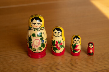 Set of traditional Russian wooden babushka dolls - matrioshka. Stacking or nested doll typical to...